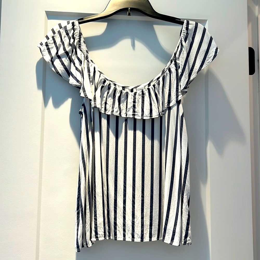 Summer blouse with feminine ruffle detail